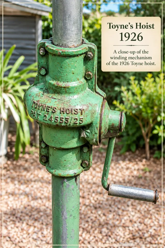 Gilbert Toyne’s 1926 rotary clothes hoist winding mechanism with a green metal crank handle.